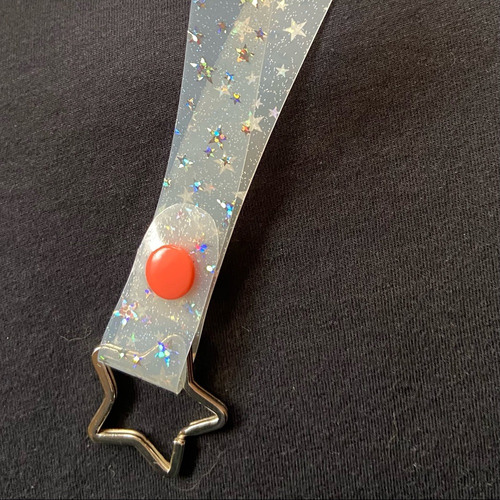 White tinted star jelly key fob with bright melon snap.